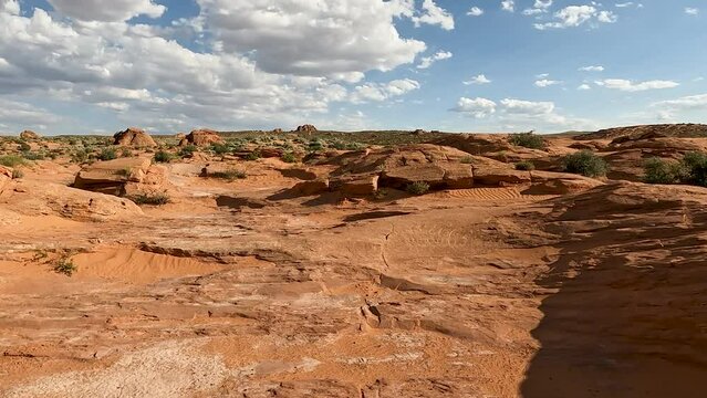 Off road trail riding rock crawling UTV POV Utah. Southern Utah desert Sand Hollow. Red sandstone, dirt sand trails. Outdoor extreme 4x4 recreation ride and adventure. Recreation in nature.