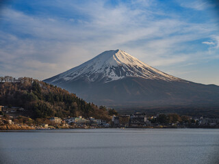mount fujiyama, fuji behind the lake with clouds and sakura