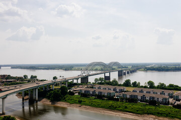Big beautiful bridge across the river on a cloudy summer day. Bridge in Memphis, Tennessee aerial...