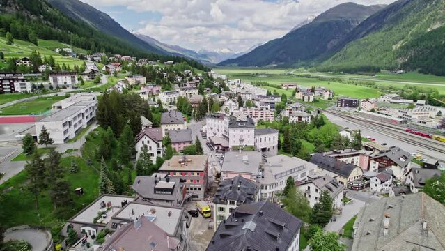 Aerial Flying Over Samedan Town In The Municipality In The Maloja Region in the Swiss canton of Grisons.