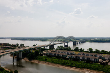 Big beautiful bridge across the river on a cloudy summer day. Bridge in Memphis, Tennessee aerial...