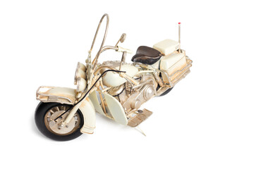 souvenir vintage toy motorcycle on a white background. Iron motorcycle.