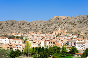 Fototapeta na wymiar Small monumental town, called Castellote, located on a mountain, Spain, Aragon, Teruel, Maestrazgo