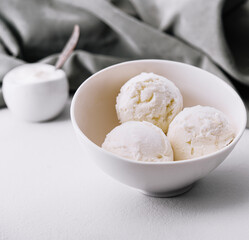 Fototapeta na wymiar Vanilla ice cream balls in bowl