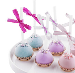 Wedding cake pops on plate isolated