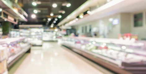 Naklejka na ściany i meble supermarket aisle and shelves blurred background