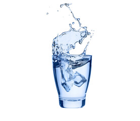 Ice cube splashes into glass of pure water
