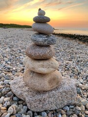 Beautiful beachscape with rocks stacked atop one another