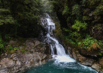 Christie Falls, a small waterfall on the side of Milford Sound highway, New Zealand