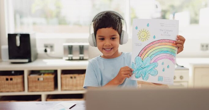 Video call, virtual school and boy with a drawing, education and excited with homework, picture and headphones. Laptop, kid and student with art, headset and knowledge with conversation and present