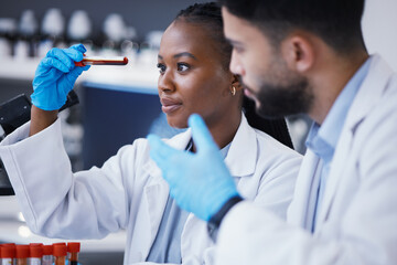 Science, collaboration and scientists with a blood test in a lab working on a experiment, test or exam. Medical, pharmaceutical and team of researchers doing scientific dna research in a laboratory.