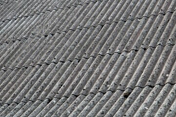 Closeup of a terracotta tiled roof with the texture of the tiles visible