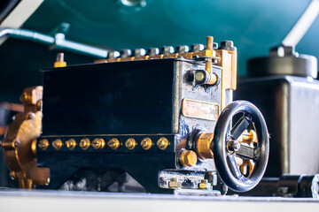 Selective focus to valve control system on a steam locomotive. Vintage train.