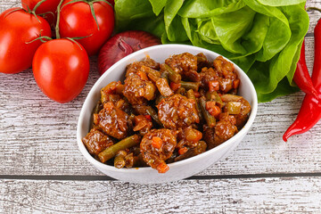 Meatball with vegetables and spices