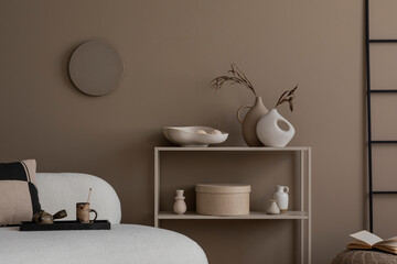 Minimalist composition of living room interior with boucle sofa, beoige rack, stylish vases with...