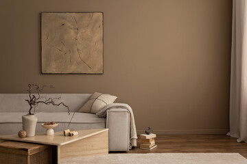 Warm and cozy living room interior with mock up poster frame, painting, beige sofa, travertine...