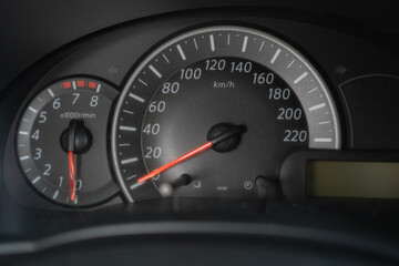 Close-up of car instrument panel, modern automobile control panel speed display.