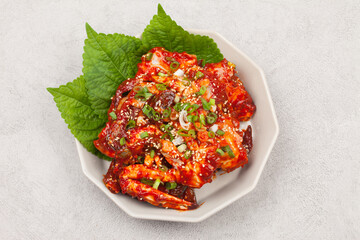 
A dish made by mixing trimmed crabs with a sauce made of red pepper powder, soy sauce, and sugar.
