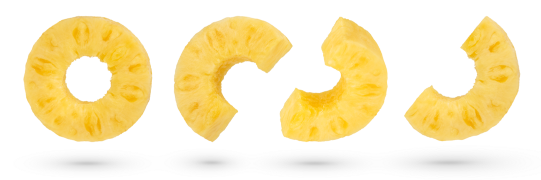 Pineapple slices on a white isolated background. Ripe pineapple cut into slices and rings. Pineapple isolate in various forms. To be inserted into a design or project.