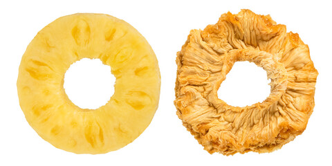 Pineapple rings on a white isolated background. Concept or process of fruit drying. Rings of ripe...