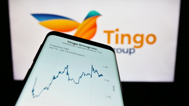 Stuttgart, Germany - 06-18-2023: Smartphone with webpage of agri-fintech company Tingo Group Inc. on screen in front of business logo. Focus on top-left of phone display.
