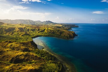 Stunning aerial view of a beach sunrise in Guam - obrazy, fototapety, plakaty