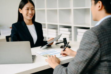 business people and lawyers discussing contract papers sitting at the table. Concepts of law, advice, legal services. in morning light