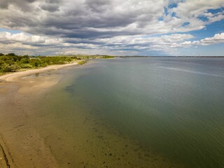 An aerial view over an empty beach in Brooklyn, New York on a beautiful, sunny day.