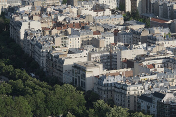Naklejka premium Paris building roofs, photos taken from the heights of Paris.It gathers many types of buildings with characteristic Parisian roofs, from various districts of the city. 
