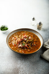 Homemade lentil soup with smoked bacon