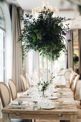 Beautiful wedding table setup with vibrant floral decorations.
