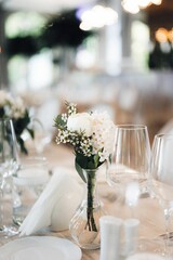 Beautiful wedding table setup with vibrant floral decorations.