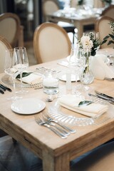 Beautiful wedding table setup with vibrant floral decorations.