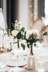 Beautiful wedding table setup with vibrant floral decorations.