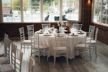 Beautiful wedding table setup with vibrant floral decorations.