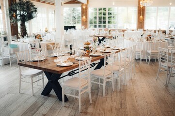 Beautiful wedding table setup with vibrant floral decorations.