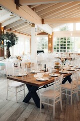 Beautiful wedding table setup with vibrant floral decorations.