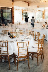 Beautiful wedding table setup with vibrant floral decorations.