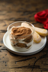 Traditional homemade tiramisu served in a glass