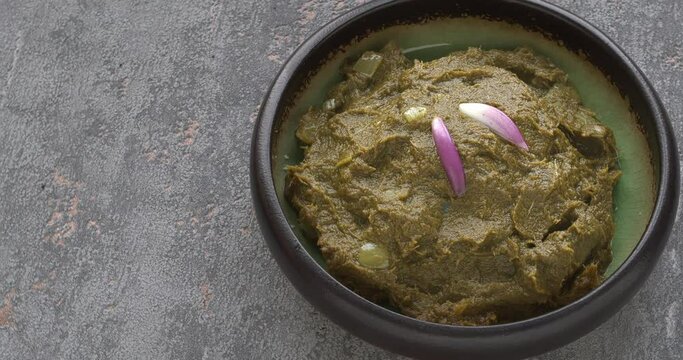 Sarson ka Saag. North Indian (Punjabi) dish. Pureed mustard greens. Seamless loop.