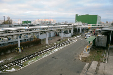 The plant territory: building, constructions stairs pipelines production hall