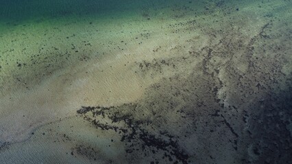 Aerial view of the sea and sandy coast