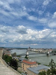 Obraz premium the view from the castle overlooking budapest's old bridge