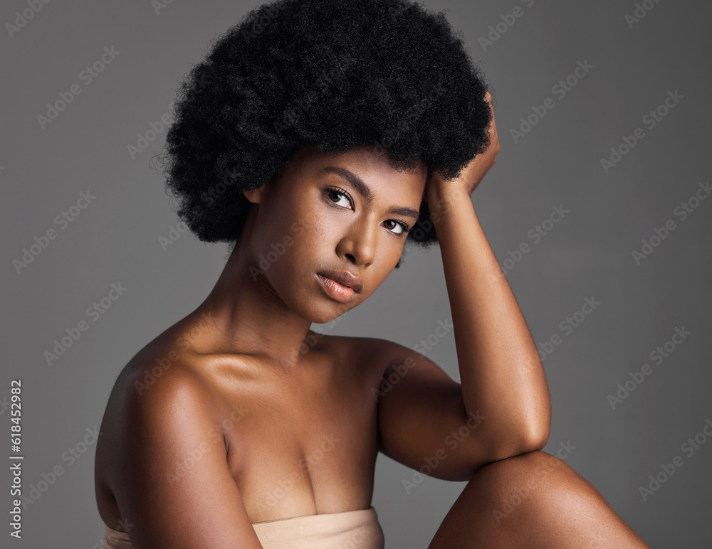 Canvas Prints Natural beauty, serious portrait and black woman with afro, cosmetics and skincare on grey background. Skin care, studio and dermatology, face of African model with salon makeup glow and wellness.