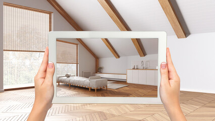 Augmented reality concept. Hand holding tablet with AR application used to simulate furniture and design products in empty wooden interior, japandi minimal living room