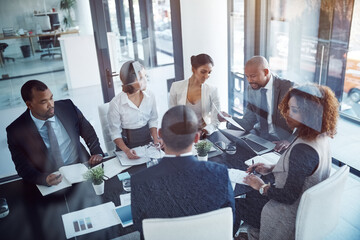 Meeting, corporate and planning with business people in office for strategy, report and teamwork. Support, collaboration and project management with employees in boardroom for workshop and solution