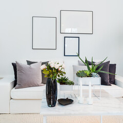 stylish home interior livingroom sofa thre empty frames