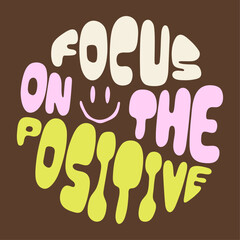 Naklejka na ściany i meble Focus on the positive. Groovy lettering on brown background. Slogan in a circle shape.