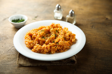 Traditional homemade risotto with tomatoes