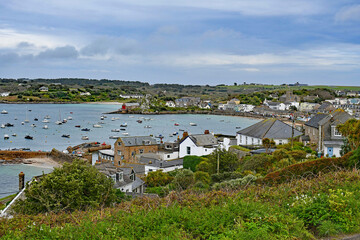 Panoramic view of picturesque Hugh Town on St Mary’s in the exotic Isles Of Scilly u.k. showing boats in the pretty harbour